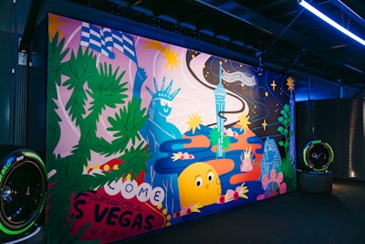 Las Vegas artist Mila May created a colorful Las Vegas Grand Prix-themed mural at the fan experience.