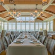 At Twenty-Eight Atlantic at Wequasset Resort & Golf Club on Cape Cod, the private dining room's focal points are its floor-to-ceiling windows that offer views of Pleasant Bay.