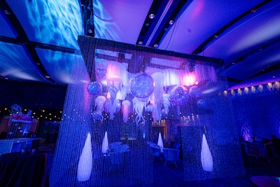 The main focal points of the event were two 24-by-24 lounges. “The crystal curtains were meant to look like ocean water, and then once [they] entered inside the structure, guests were ‘submerged’ in the underwater fantasy with ethereal elements,” she explained.