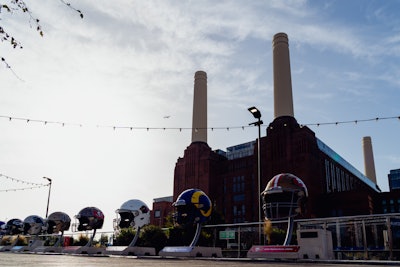 Giant helmets representing all 32 teams, plus a bespoke 2023 NFL London Games helmet, were on display on The Coaling Jetty on the Thames.