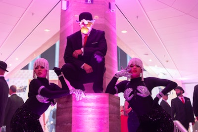 Interactive live spy actors engaged ball attendees to become OCULUS spies, tasked with recovering the stolen 'Le Sceptre Rose' masterpiece during the cocktail reception.