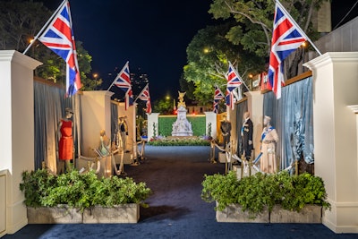 As guests entered the event, which took place in Westwood Village in Los Angeles, they walked past classic British iconography, flags, and costumes from the show.