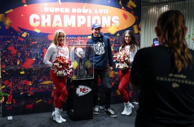 Fans could check out replica lockers designed like those at GEHA Field at Arrowhead Stadium and put on shoulder pads and helmets; step up to a podium in front of a branded backdrop, just like at a press conference; and get their photo taken with the club's Super Bowl LVII Lombardi Trophy.