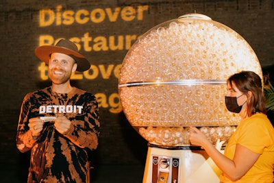 The Amex Gold Card Pop-Up Diner came to Chicago, Philadelphia, Washington, D.C., and Brooklyn in 2021. The traveling outdoor restaurant experience brought together chefs from top Resy restaurants, all of whom put their own spins on classic diner dishes. American Express Gold Card Members—either diner guests or even passersby—could play The Goldball Machine, a six-foot, five-inch-tall gumball machine filled with gold balls.
