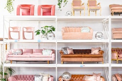 Something Vintage's colorful pink sofas line their DC showroom.