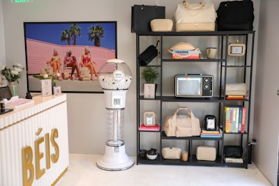 Travel gear and accessories brand BÉIS launched in 2018 with the idea that every traveler can jet-set in style without breaking the bank. So for its first experiential activation—which popped up in Los Angeles in 2022—a motel theme felt like an appropriate fit. The BÉIS-branded brick-and-mortar space, which was created in partnership with creative agency MKG, was a 270-square-foot pop-up decked out in all things BÉIS. A fun, on-theme touch? A gumball machine filled with white and black gumballs, where guests could spin to win. If they received a black gumball, they could choose a small product of their liking to take home. See more: Vacay State of Mind: Shay Mitchell's BÉIS Hosts Motel Pop-Up in LA