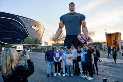 The towering figure started the day in an oversize toy box before being taken around stadium grounds and eventually inside the venue. “This activation builds on the successful first season by promising fans that the Reacher everyone loves is back and bigger than ever, emphasizing Reacher's towering size in an impactful and conversation-provoking way,” said the Amazon MGM Studios team in a joint statement to BizBash. “Bringing a larger-than-life Jack Reacher action figure to a culturally relevant moment like Thursday Night Football is about portraying our hero’s physical dominance while uniting football and Reacher fans alike to celebrate the premiere of season 2.”