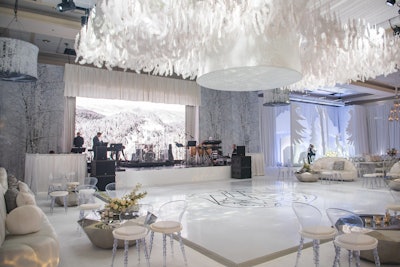 TPD Design House also designed and produced 15,000 laser-cut paper fir leaves for an installation, which was installed over the dance floor. See more: See How the Engage!18 Wedding Summit Captured the Canadian Spirit