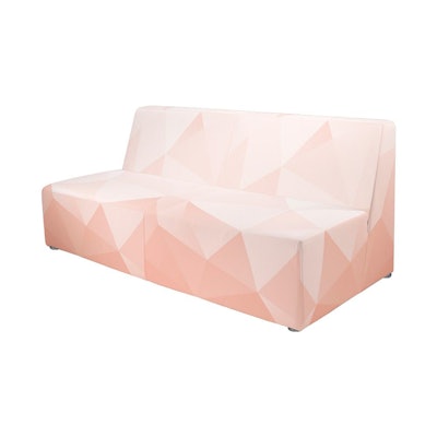 Cort Events allows clients to customize its furniture pieces like the Brighton Loveseat (pictured) with fabric slipcovers such as this geometric patterned one in shades of peach.