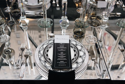 Decor featured mirrored and reflective elements, along with subtle black and white details. The event was a collaboration with experiential agency The Concierge Club.