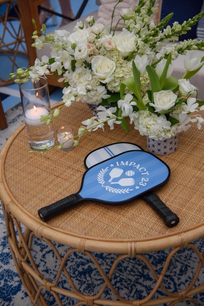 Conference attendees received custom-branded uniforms and paddles, which were ready for them in their hotel rooms upon arrival. The court also featured a custom lounge area featuring a lighthouse motif, a nod to the event’s coastal location.