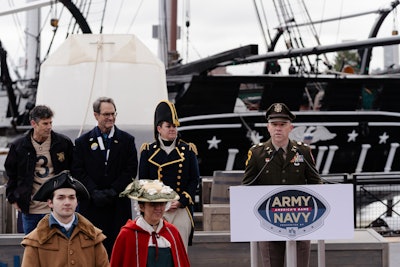 Tea was sourced from three veteran-owned small businesses and was imported to the site of the USS Constitution for public display. The bag of tea then traveled throughout the city for the Patriot Games parade Dec. 8, as well as the Fan Fest activation at Gillette Stadium that same evening. The display was then donated to the Boston Tea Party Ships & Museum for its historic celebration Dec. 16. For the USAA team, the stunt was all about finding a unique way to celebrate the sports rivalry in the birthplace of the American Revolution. “Featuring tea sourced from three veteran-owned tea companies, USAA was able to support the military community while celebrating the 124th playing of the Army-Navy Game and the 250th anniversary of the Boston Tea Party,' said Jen Escobar, senior marketing officer at USAA, who playfully refers to the stunt as 'MASSive,' a nod to its Massachusetts setting. 'The 374-pound bag of tea made its way around the city over the course of the week, and extended even further with record-breaking results on social media.”