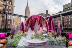 An interactive custom snow globe includes the backdrop of the Empire State Building. Yvonne Najor, vice president of Tao Group Hospitality, conceptualized the pop-up, in collaboration with Design House Decor.
