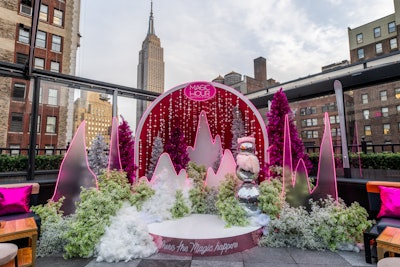 An interactive custom snow globe includes the backdrop of the Empire State Building. Yvonne Najor, vice president of Tao Group Hospitality, conceptualized the pop-up, in collaboration with Design House Decor.