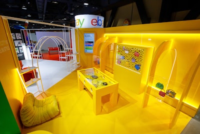 The yellow office was focused on luxury items that can be found on eBay. The team created various LED backlit arch photo moments, plus a custom display case with tubes where fans could visualize luxury watches on their own wrists.