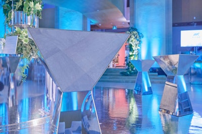 Mirrored angular high-tops and cool-tone light-blue velvet soft furnishings continued the theme, while blended-up lighting had a tonal array from teal to violet.