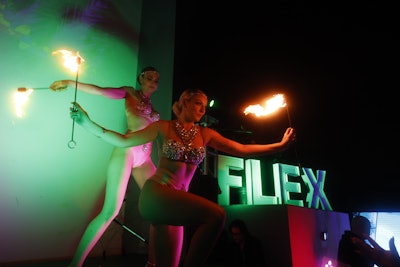 Oversize FLEX and BASEL signage offered dramatic decor as fire performers wowed the crowd.