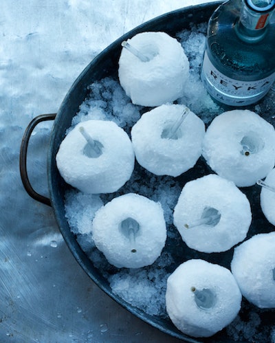 For a 2018 winter wonderland-theme party, New York-based Peter Callahan used actual snowballs to serve cocktails. The tray was laid with shaved ice to hold the snowballs in place, and the team carefully measured the amount of the drink to commensurate with the time the guest could comfortably hold the snowball—no gloves required. See more: Best of 2018: Caterers Describe the Coolest Dishes They Created This Year