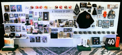 The gifting experience featured an expansive salon-style gallery wall with a decade of souvenirs and memorabilia.