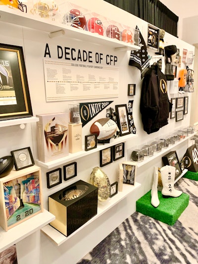 Designed to be an on-site museum, the display featured curated objects that told the history and heritage of the championship events—everything from trophies, hand-painted footballs, and tickets to original drawings and kids’ accessories.