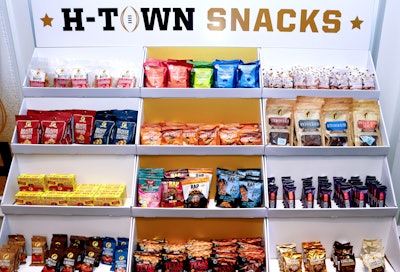 “H-Town Snacks” were presented on miniaturized stadium-style stands along with a Dr. Pepper bar.
