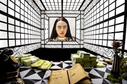 The “salon” was adorned with taxidermied creatures, mementos from Bella's journey, and portraits from the film.