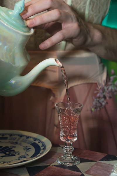 The final act of beauty was represented with a Fords Gin cocktail, a unique take on a French 75 poured from a teapot and adorned with a spritz of rose from an antique perfume bottle.