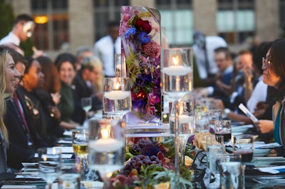 An April 2022 dinner for editors and influencers to celebrate the launch of Fairmont's new book, Grand by Nature, made for a glamorous evening at New York's Rockefeller Center. A highlight? This impressive tablescape with florals encased in ice. These striking centerpieces were made by Okamoto Studio with colorful blooms from The Mini Rose Co. The Grand by Nature book itself was also encased in ice, with florals matching its cover to add an extra wow factor. Surrounding the ice sculptures were fruit, figs, and moss to lean into the nature-inspired evening, which was produced by Studio HS. See more: How Fairmont Hotels Brought the Brand's History to Life During Intimate Book Launch Event in NYC