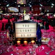David Stark also created unique centerpieces for the 2018 Robin Hood benefit, also held at the Javits Center. The event, which had a “Lights of New York” theme, featured three-sided mini marquee centerpieces that offered messages of gratitude and celebrated the organization's anniversary.