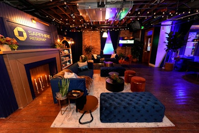 The interior featured a relaxed living room setting with seating in the brand's signature blue.