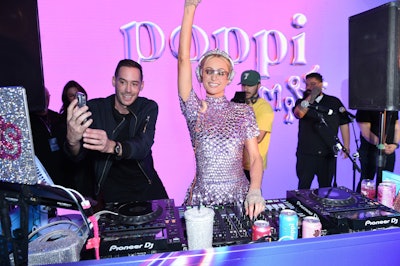 During the VIP launch party on Jan. 26, Paris Hilton performed a DJ set.
