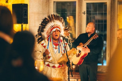 Hal Eagletail gives a blessing at Incentive Winter's opening reception in Banff.
