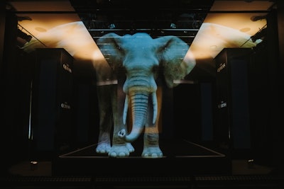 Act III was about the elephant from “Savanna Queens” and showcased a hologram of the animal alongside a model in a custom design by Theophilio that featured a shape and sleeves inspired by an elephant and her trunk.
