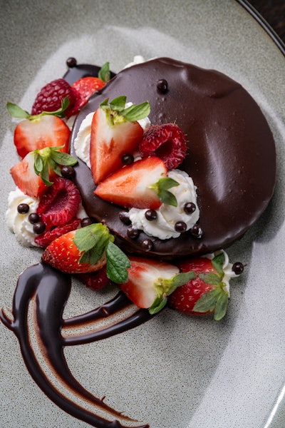 On V-Day, Guinness Open Gate Brewery in Maryland will host a Valentine's Day beer dinner for couples. On the menu? This Guinness draught stout cheesecake paired with milk stout chocolate ganache.