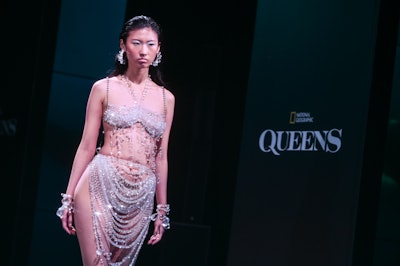 Act II showcased a hologram of the brown bear from “Coastal Queens'' with a model walking in a custom design by JèBlanc that was dripping with Swarovski crystals to represent water.
