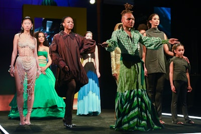 Brooklyn-based “plantfluencer” Plant Kween, who opened the show as 'Mother Nature,” is seen with the show's models.