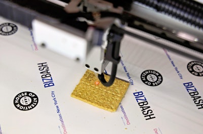 House of Attention's food laser could laser-engrave guests' s'mores graham crackers with 'BizBash.'