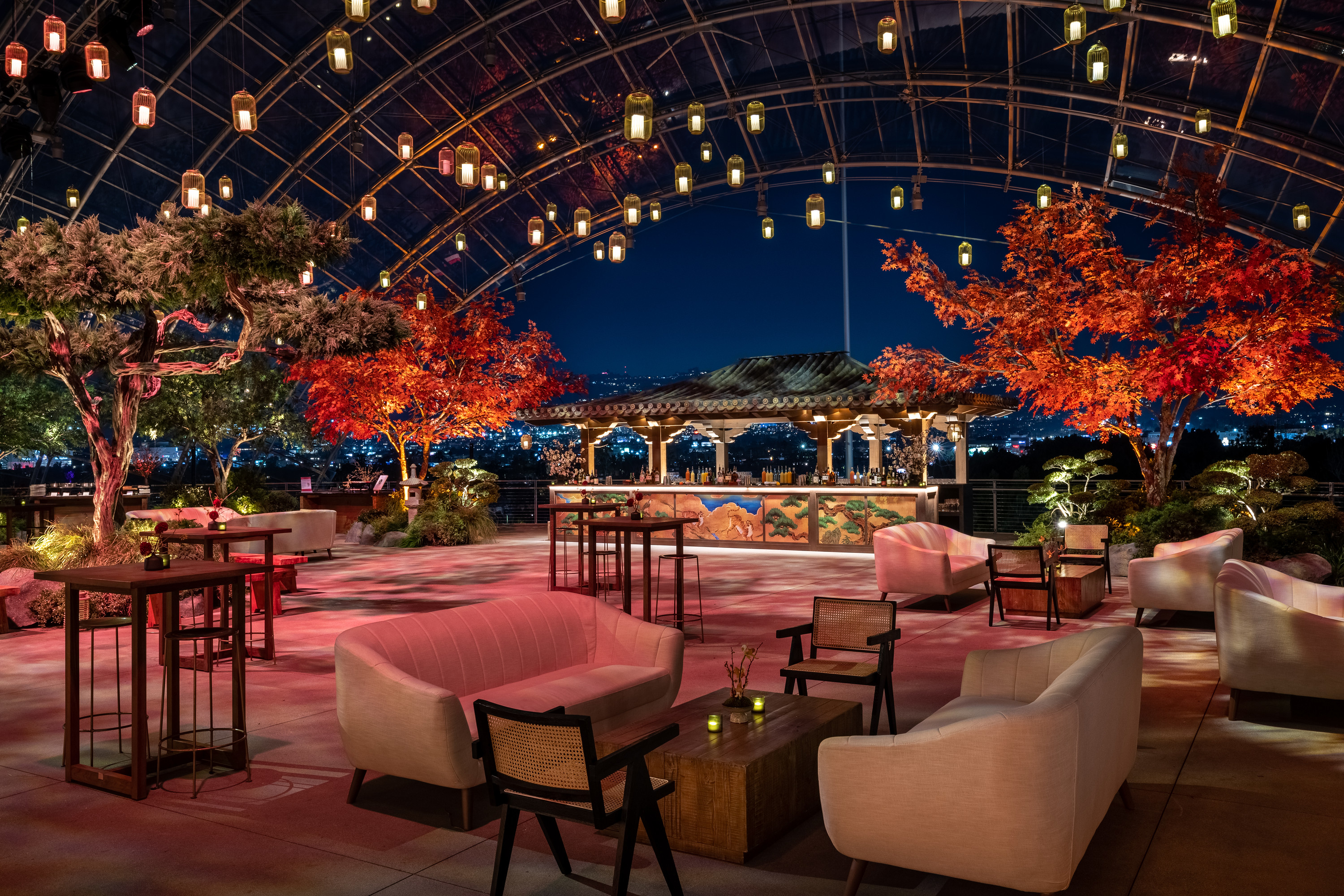 For the after-party, Event Eleven built three 30-foot pagodas and hung 300 lanterns from the ceiling. They also brought in a 20-foot-tall bonsai tree and a variety of 30-foot red maples, along with other greenery and foliage. '[It all] helped create the organic atmosphere and helped transport guests into a gardenlike room,' said Schubert.