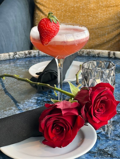 D.C. rooftop restaurant and bar Smoke & Mirrors is offering a Valentine's Day-inspired menu chock-full of inspo. That includes this Rosas in Bloom cocktail—available throughout the entire month of February—featuring Código 1530 Rosa tequila, Licor 43, strawberry puree, lime juice, and egg white.