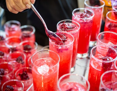 For a ruby-red cocktail, try this concoction made with Deep Eddy Vodka, Campari, raspberry, lemon, and hibiscus flower—as seen at the 2022 RAMMY Awards in Washington, D.C., where the program was celebrating its ruby anniversary (40 years).