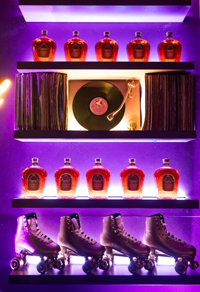 The bar's eye-catching design incorporated record players, roller skates, and Crown Royal bottles. During Super Bowl weekend, CNC Agency also created a VIP Crown Royal reception bar and two VIP lounges within the Pearl Theater.