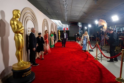 Guests who had purchased tickets to the event had the chance to walk the red carpet, explore the museum's 50,000 square feet of galleries, and accept their own awards in the museum's Oscars Experience. They could also shop for exclusive merchandise at the Academy Museum store and sip on cocktails inspired by this year's Best Picture nominees at on-site restaurant Fanny’s.