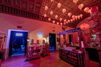 The party featured 10 themed areas, including a Chinatown night market, an Egyptian lounge with a tarot card reader, an Italian trattoria, and a casino with a charity component.