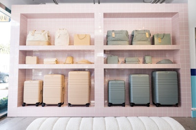 While waiting for their luggage, visitors could browse the collection (including upcoming styles for kids) and shop on site for delivery later.