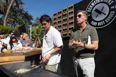 The indoor-outdoor schedule also invited attendees to engage with brands and influencers. At the outdoor Schweid & Sons booth, Bobby Flay teamed up with Owen Han for a lively cooking demo.