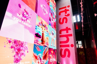 “It’s an interesting challenge to design a space that must bring a campaign world to real life, and yet allow for the public to shape it to their will,” Robinson said. Elements like chrome walls, neon lights, and a variety of colorful sculptural elements like that found in the brand’s “It’s This” TV commercials were incorporated into the space.