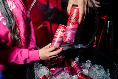 Coca-Cola brand ambassadors were stationed throughout the space to offer samples.