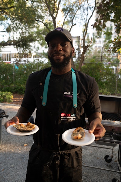 The Circle’s Suzan McDowell was especially proud to bring up-and-coming chef Daren Reid from PurpleLit Oyster Company to the festival this year to share his chargrilled oysters. For Overtown EatUp eaters, he topped them with Cajun butter, Pecorino Romano, Parmesan, and Maine lobster.