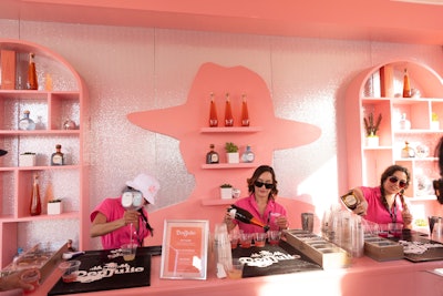 Don Julio’s popping pink retro tequila bar featured cutouts of the namesake founder, along with disco ball decor.