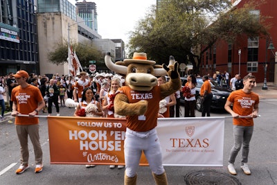 Centered on the motto “What Starts Here Changes the World,” there were daily panels with alumni and professors, nightly concerts and DJ sets, art installations, college basketball watch parties, and even a parade by the official marching band through downtown Austin leading into the venue.